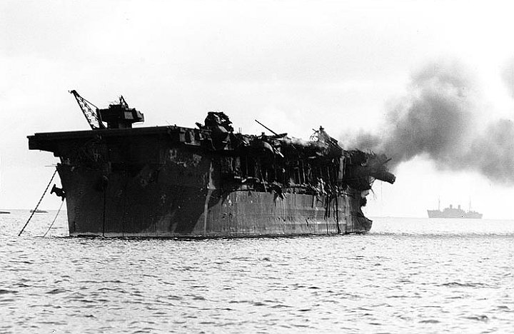 USS_Independence_CVL-29_burning.png - Independence, ship #28, showing blast damage from Able, before Baker made her radioactive.