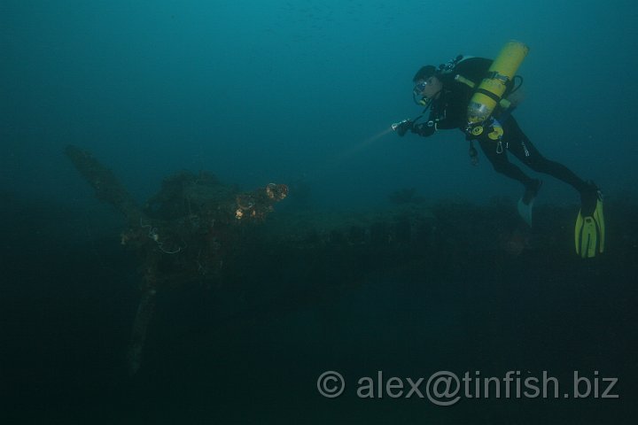 Kawanishi_Sea_Planes-32.JPG - Ben looks at one of 4 engines