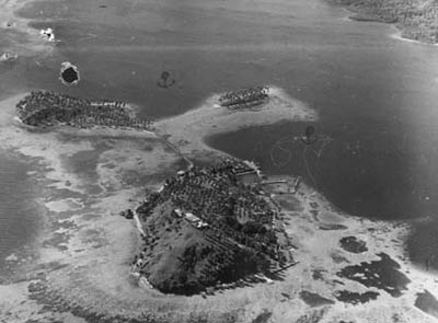 ghavatu-1940.jpg - An aerial photograph of Ghavutu Island in 1940. The wharf is located top right of island. Tanambogo Island is top left.