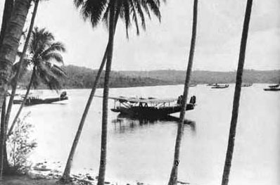 mavis-tanambogo.jpg - A photograph taken from Tanambogo Island with a number of Mavis flying boats at anchor