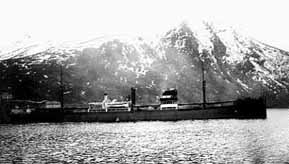 Strassa.jpg - M/S Stråssa was a Swedish ore carrier sunk on the 10th April. She is standing on her keel next to Martha Hendrik Fisser. Parts of the wheelhouse are still intact, and tools and a lathe can be seen inside the engine room that lays open with easy access. Size (length): 127m. Diving depth: 15-28m