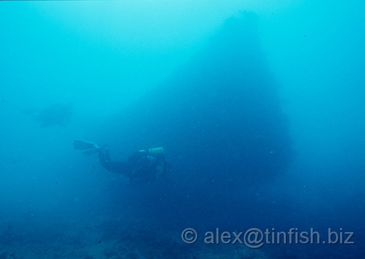 Bow2.jpg - Divers swimming around the bow of the Gunboat