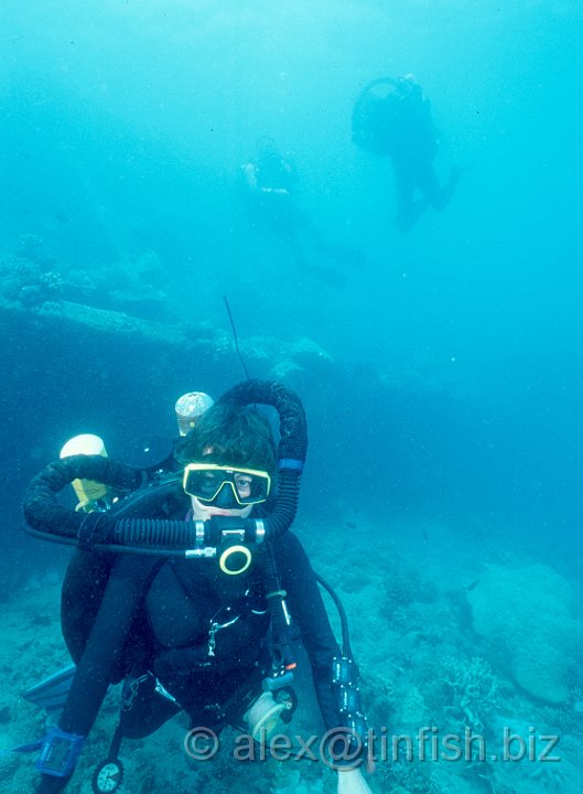 Scan430.jpg - Divers swimming around the Gunboat