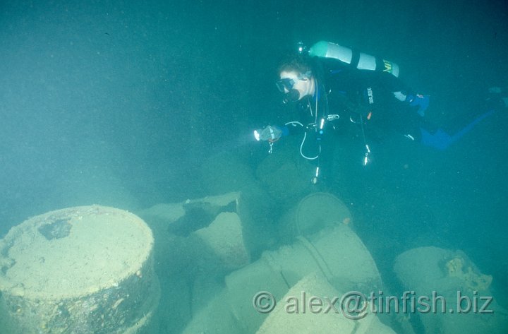 Scan584.jpg - Oil drums inside a hold on the Olympia Maru