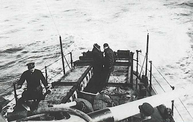 Depth_Charge_Rack-2.jpg - Depth charges rolled off the back